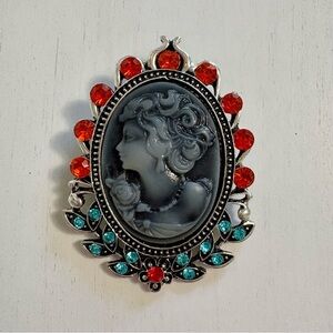 Vintage-Inspired Grey Cameo Brooch with Red Orange and Teal Stones